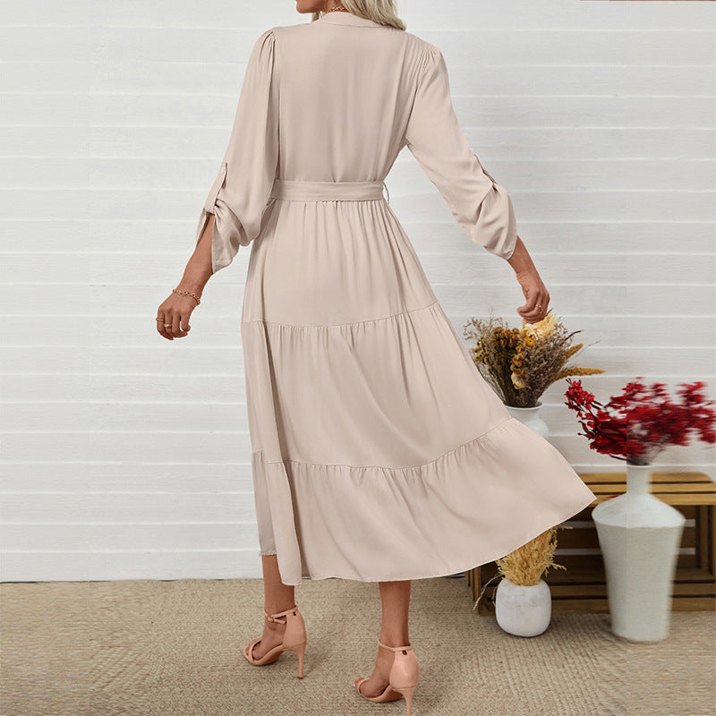 Stand up collar long sleeved solid color jumpsuit long skirt with belt