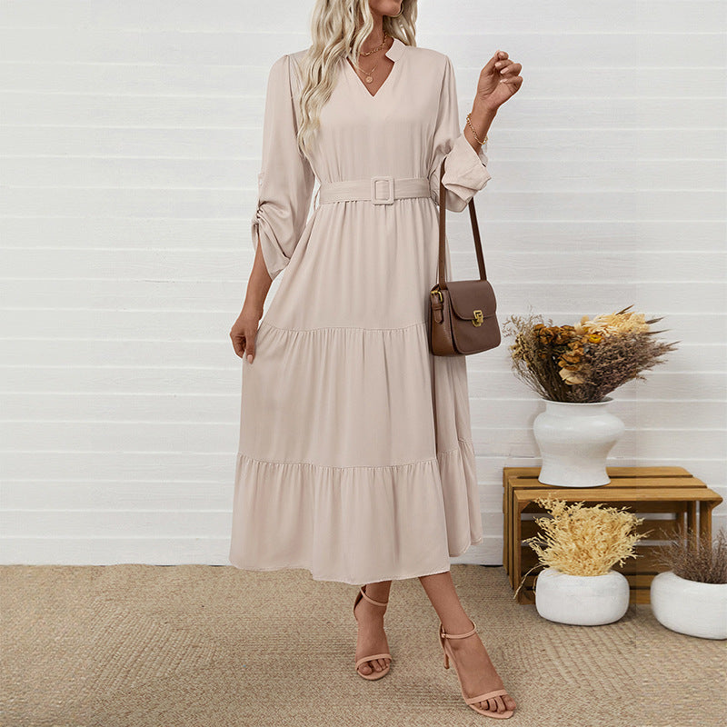 Stand up collar long sleeved solid color jumpsuit long skirt with belt